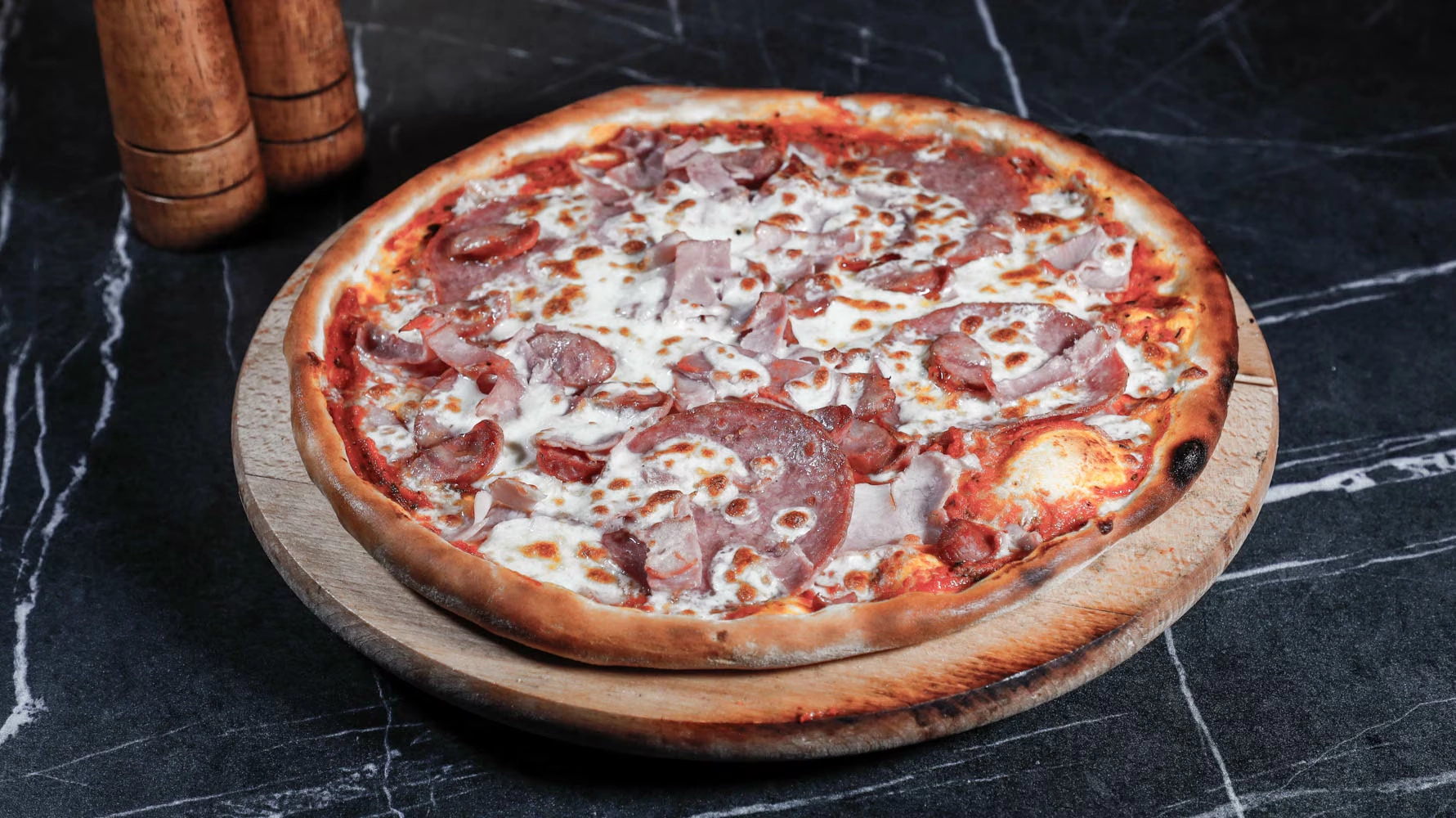 Infinity Lounge PIZZA QUATTRO CARN